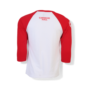A raglan shirt with red sleeves and white body, featuring the words "Carnegie Hall" in red lettering. 