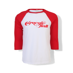 A raglan shirt with red sleeves and white body, featuring the words "Carnegie Hall" in red lettering. 