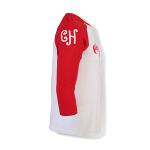 A raglan shirt with red sleeves and white body, featuring the letters "CH" in white lettering. 