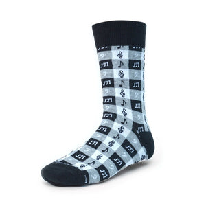 A single sock with black tipped toe featuring a checkerboard pattern of musically themed icons. 