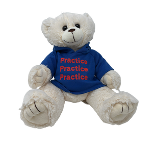 A white plush teddy bear wearing a blue hooded sweatshirt. 