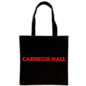 A black tote bag with the words "Carnegie Hall" in red. 