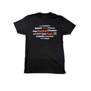 A black t-shirt featuring the words "this is zankel hall" in red surrounded by white text naming various music genres. 